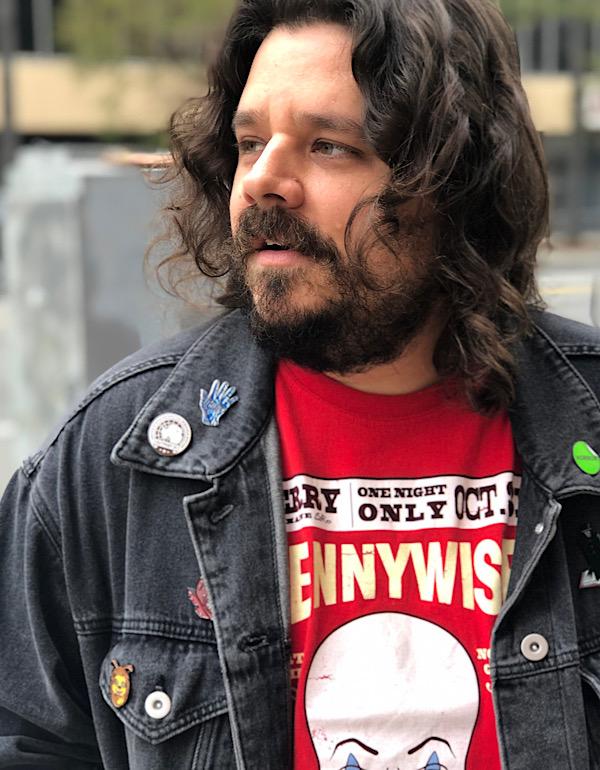 A photograph of director Paul Davis