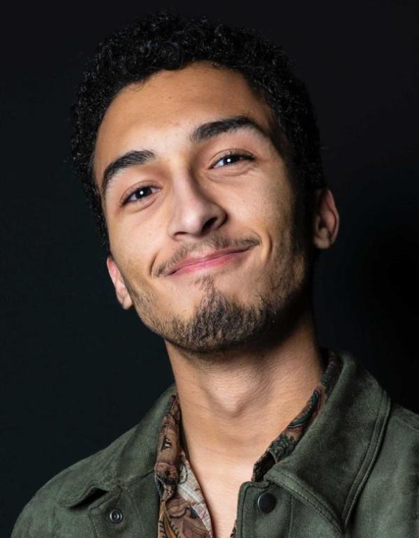 Headshot of director Logan Weisberg