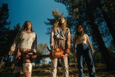 Three women standing strong