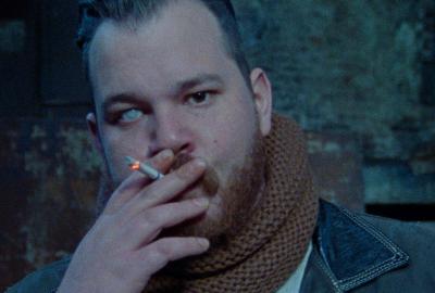 Bruno Veljanovski as "Saint Peter" smokes