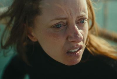 A sailor looks on in fear