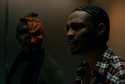 Brad,being glared at by a ghost with a smashed pumpkin head