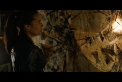 The director looks at paper diagrams