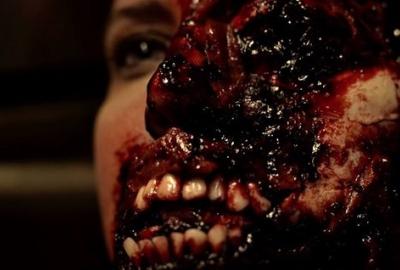 Yummy Meat: A Halloween Carol film still bloody chewed up face