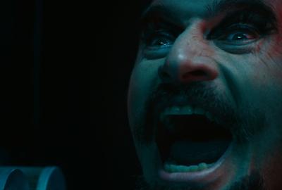 Good Head film still man's head is screaming