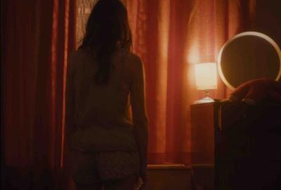 Real Gods Require Blood film still woman looks out the window