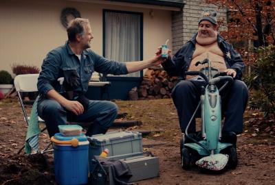 Shiny New World film still men talking