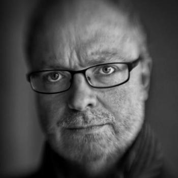 Director Chris W. Mitchell