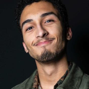 Headshot of director Logan Weisberg